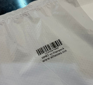 Etiqueta en tapa de botella