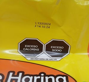 Etiqueta en tapa de botella